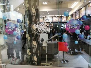 Barber pop-up shop in busy mall in johannesburg